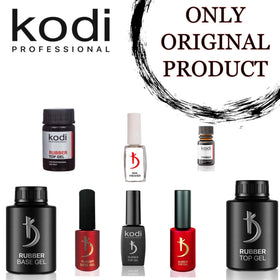 kodi professional 10ml primer next to a coin showing compact travel size