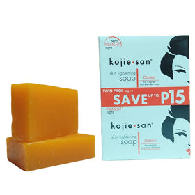 Kojie San ingredients label showing kojic acid, coconut and tea tree benefits