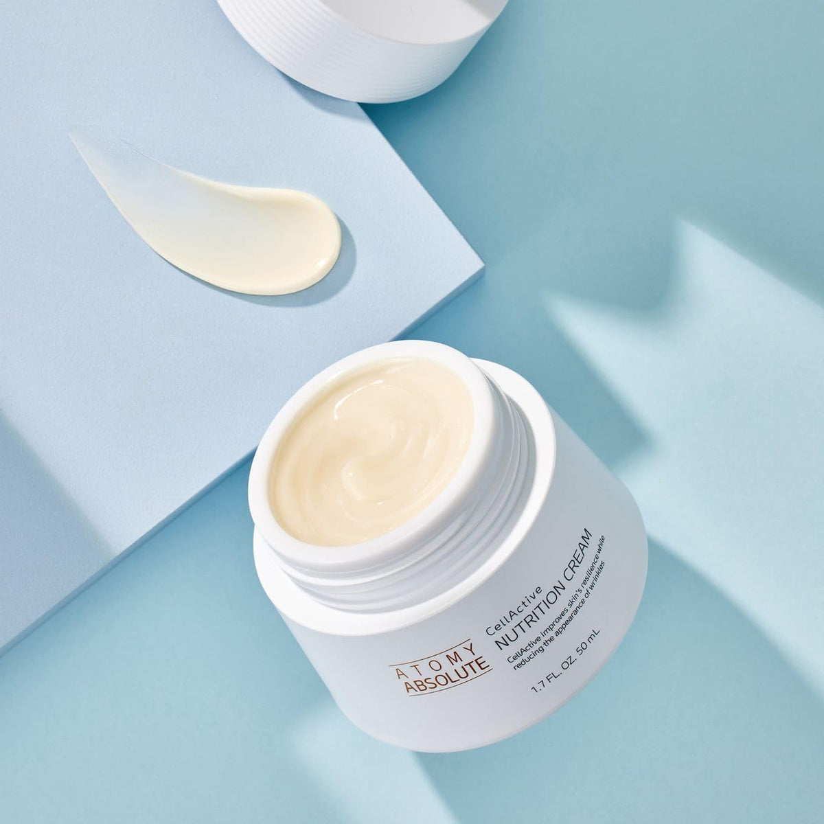 Konipl Atomy Absolute CellActive Cream texture close-up demonstrating creamy, fast-absorbing hydration