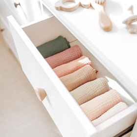 Konssy rolled towel inside toiletry bag illustrating travel-friendly compactness benefit