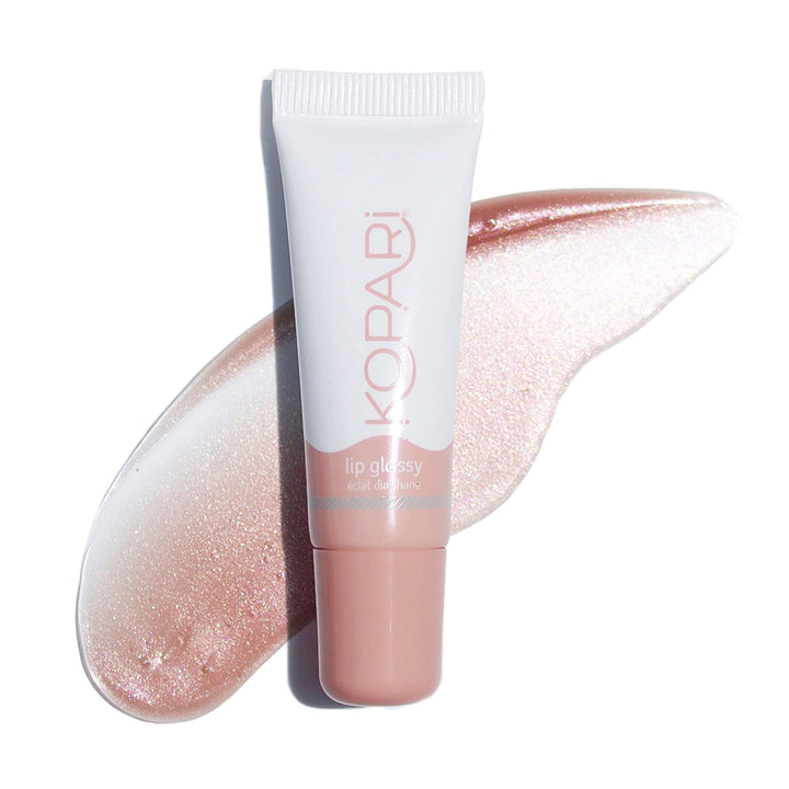 Kopari front packaging showing Birthday Suit gloss and glossy benefit