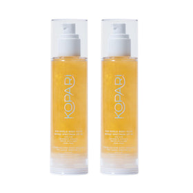 kopari bottle front packaging showing gold shimmer and SPF 50 benefit