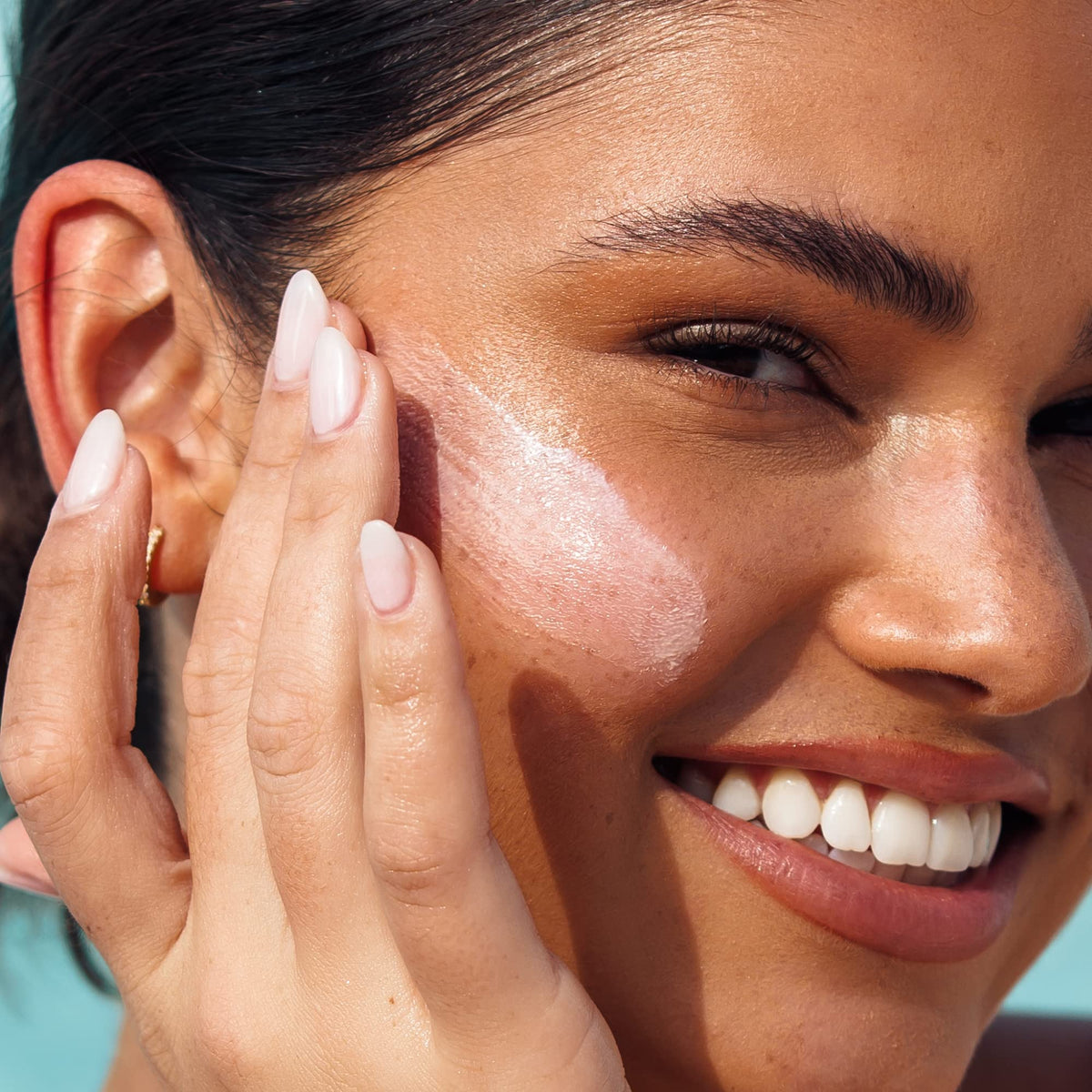 Kopari layered under makeup showing smooth, non-pilling base