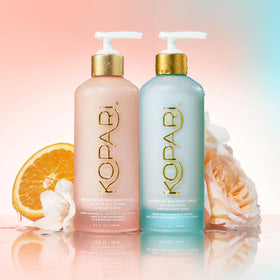 Kopari bottle on beach towel lifestyle shot conveying fresh coconut scent