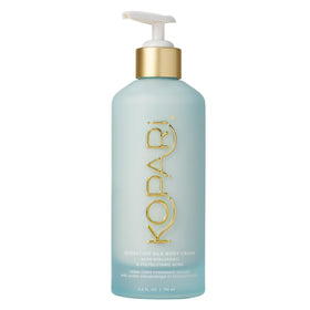 Kopari front packaging showing bottle and coconut-milk scent benefit