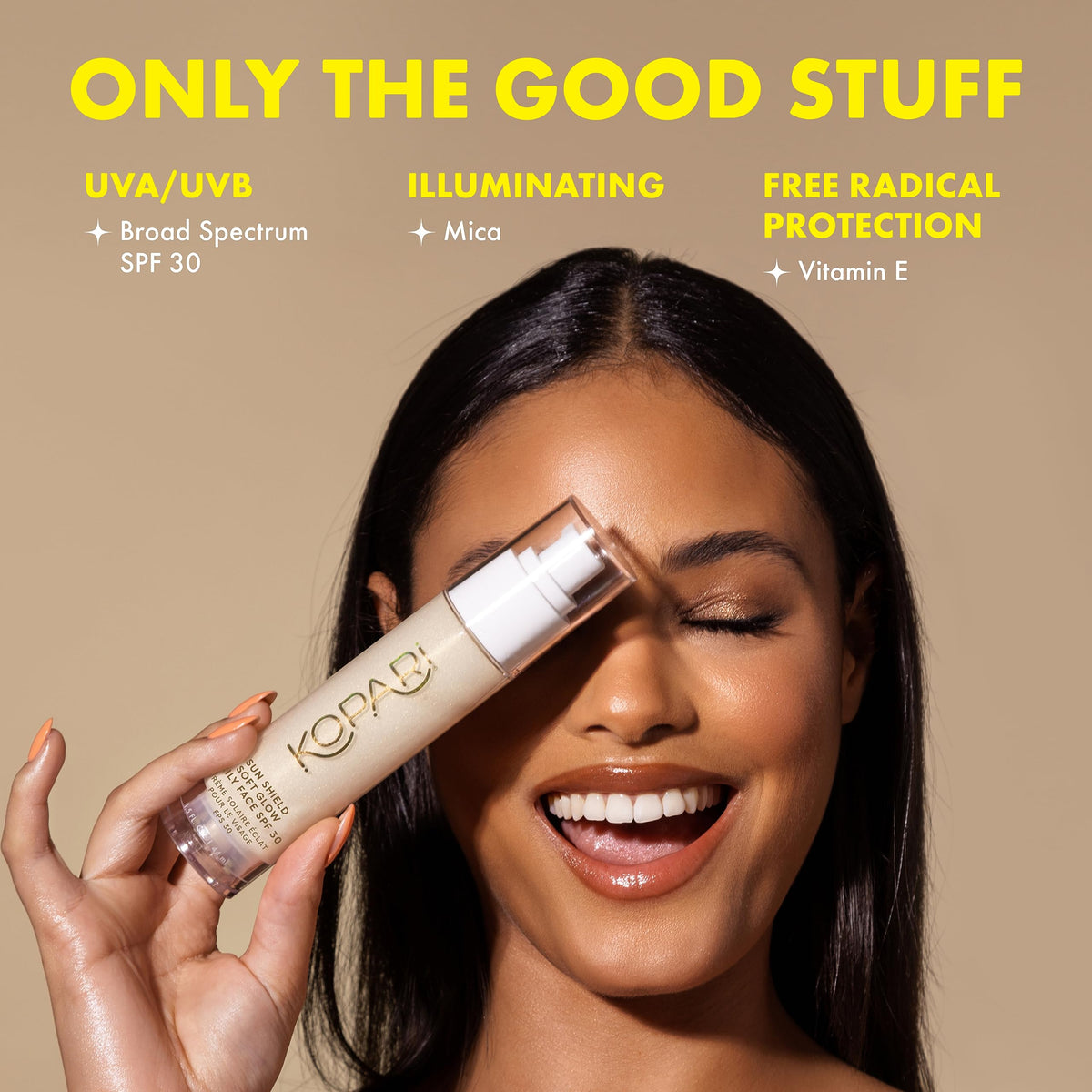 Model applying Kopari as primer for smooth makeup finish