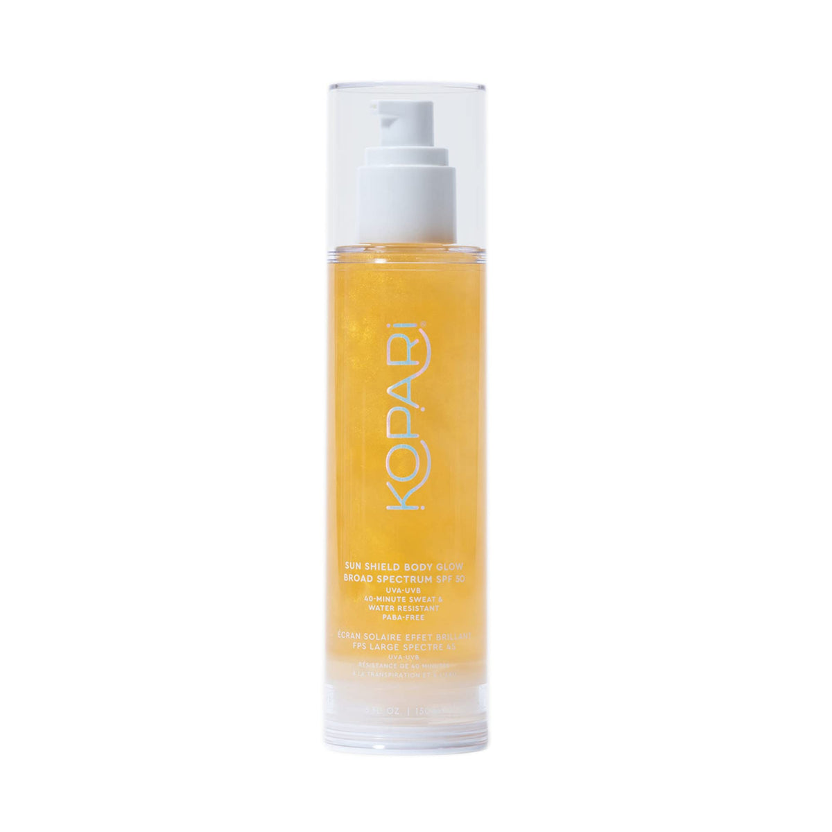 Hand holding Kopari 5 oz tube to show actual product size and portability