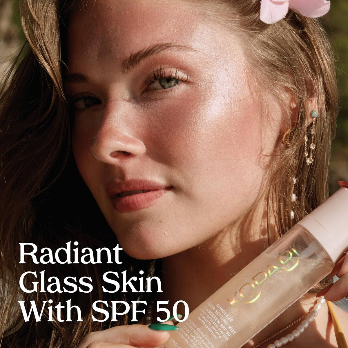 Kopari Sunglaze fine mist spraying over skin for even protection benefit