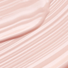 KORA Organics jar open showing smooth cream texture for hydration