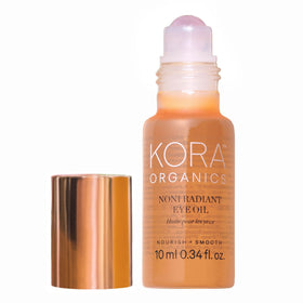 KORA Organics front packaging showing bottle and rose quartz roller for gentle application