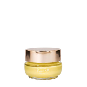 KORA Organics front packaging showing travel-size moisturizer and benefits