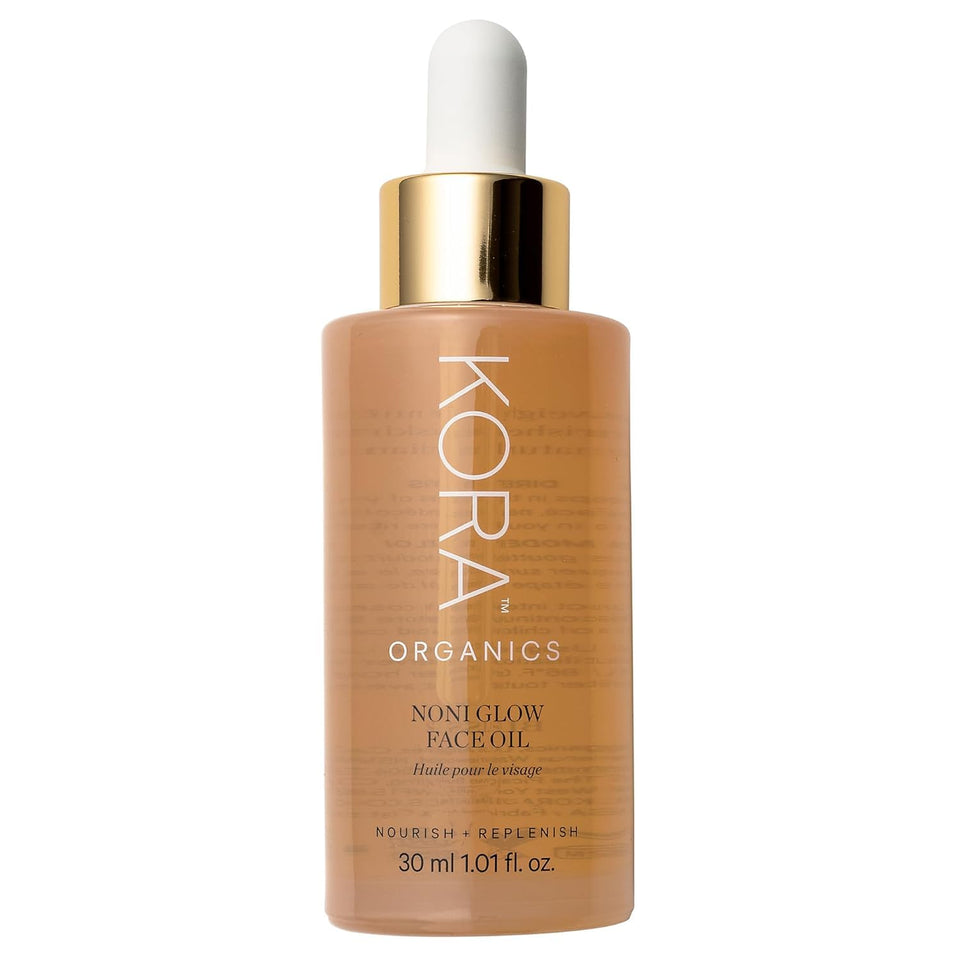 KORA Organics bottle front view showing clean organic branding and glow benefits