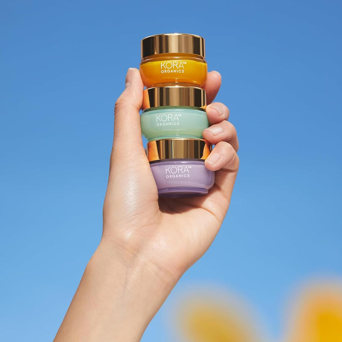 KORA Organics moisturizer inside travel bag illustrating portability benefit