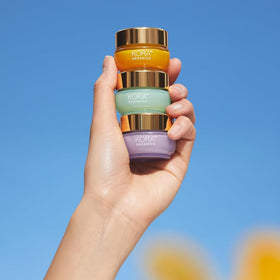 KORA Organics moisturizer inside travel bag illustrating portability benefit