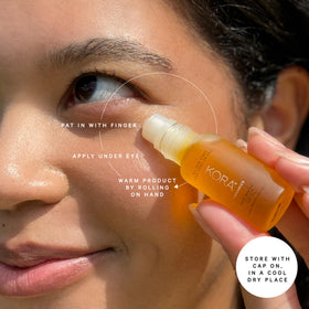 KORA Organics rose quartz roller close-up delivering cooling massage and precise application