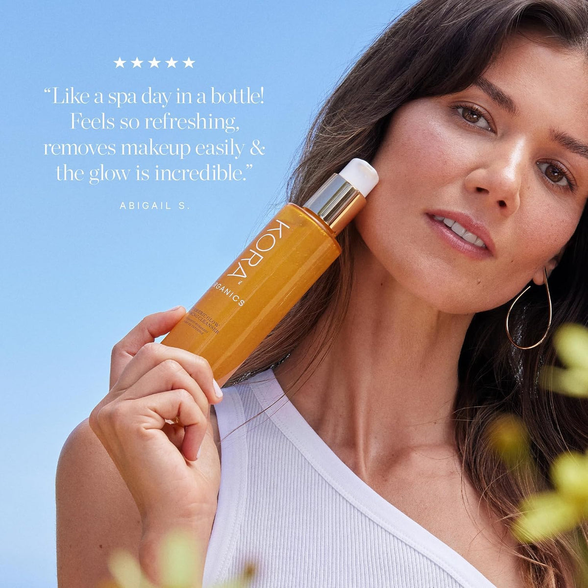 KORA Organics 150 ml bottle in hand illustrating product scale