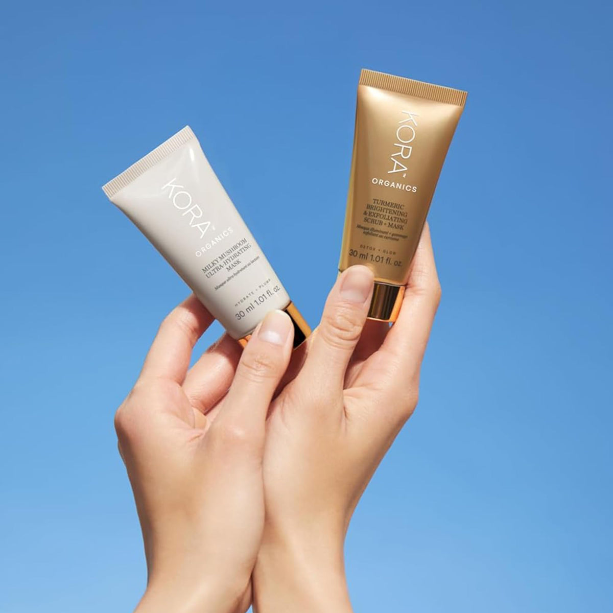 KORA Organics mask styled in a travel kit illustrating on-the-go skincare benefit