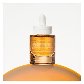 KORRES serum applied on hand proving smooth layering and fast-absorbing feel