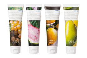 KORRES applying Elasti-Smooth body butter to lower leg after shower demonstrating fast absorption and smooth feel