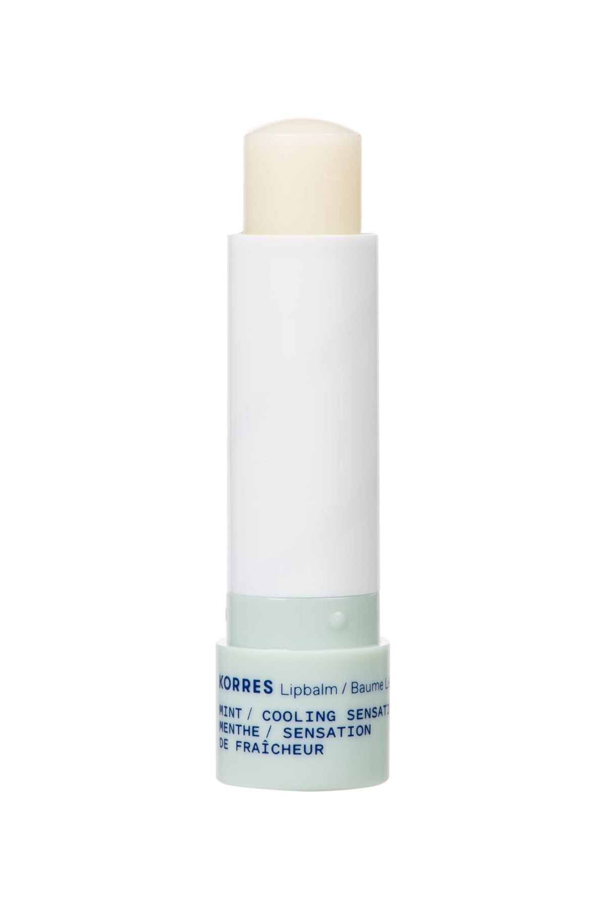 KORRES lip butter stick in hand illustrating size and portability for on-the-go hydration benefit