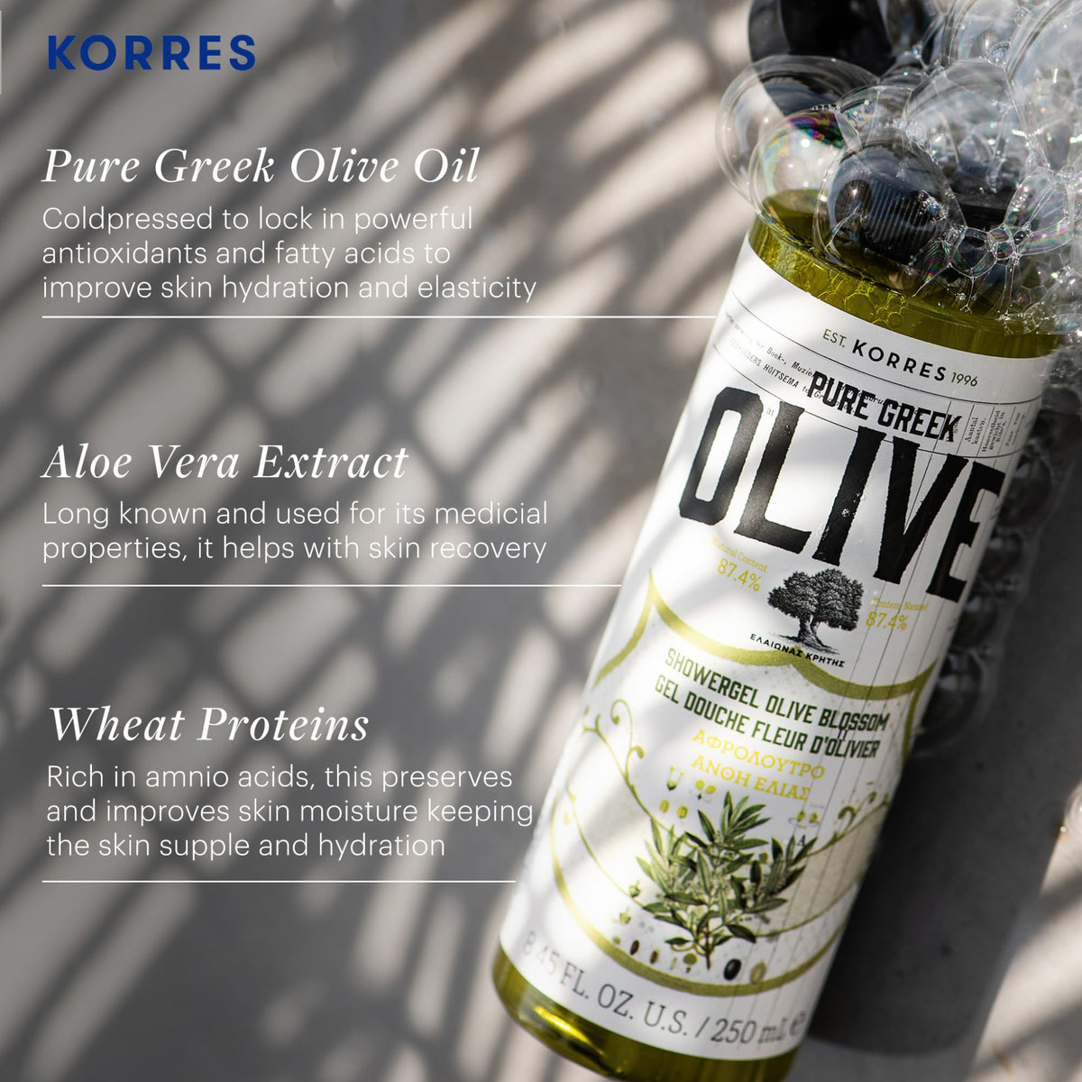 KORRES label detail with olive blossom scent and ingredient clarity benefit