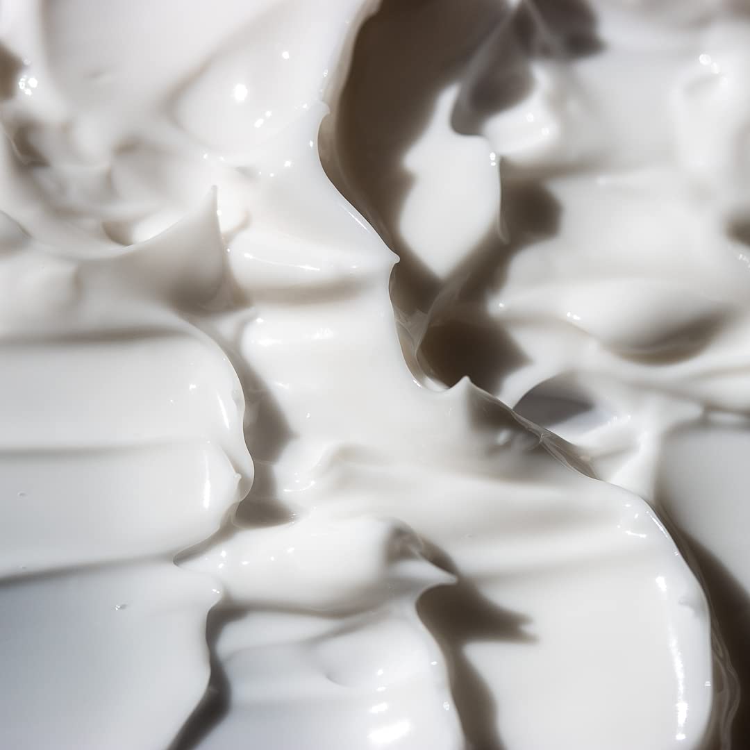 KORRES cream being applied to arm showing smooth, moisturized skin