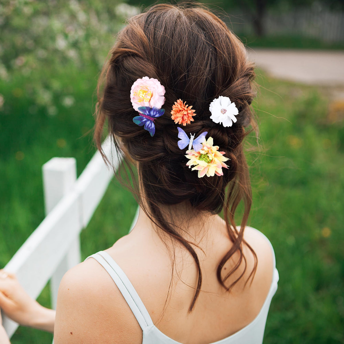 KorViSHOW hair styling image with clips securing braid and adding flair