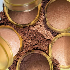 Kosas bronzer inside a makeup bag showing everyday portability benefit