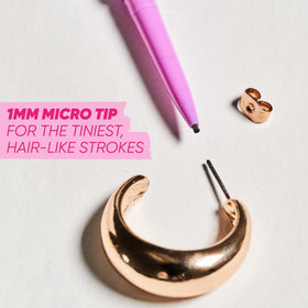 Kosas Brow Pop Nano texture stroke on skin illustrates smooth, buildable color
