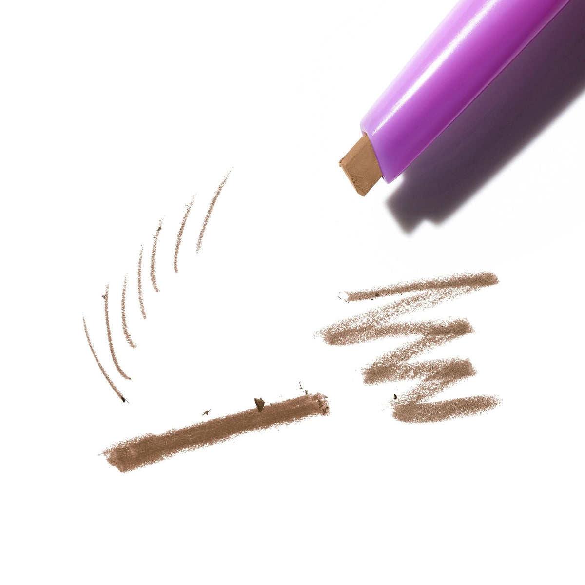 Kosas Brow Pop spoolie detail demonstrating blending for a natural finish