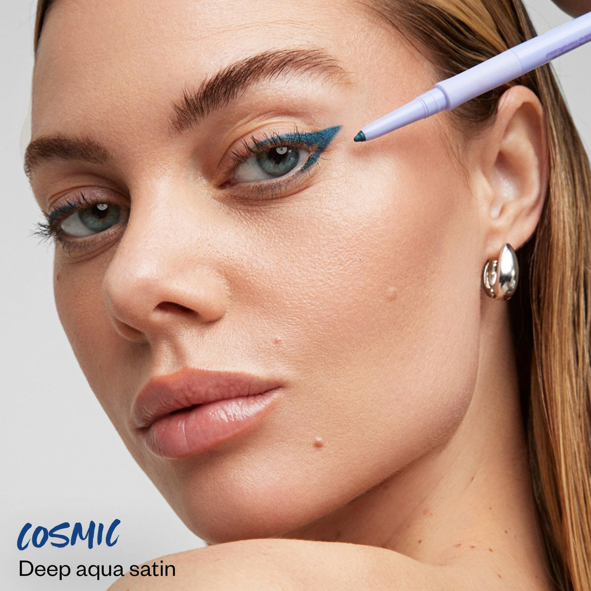 Kosas Soulgazer cap removed revealing smooth pencil tip for precision