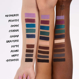 Kosas arm swatch of blackened blue satin displaying rich color depth