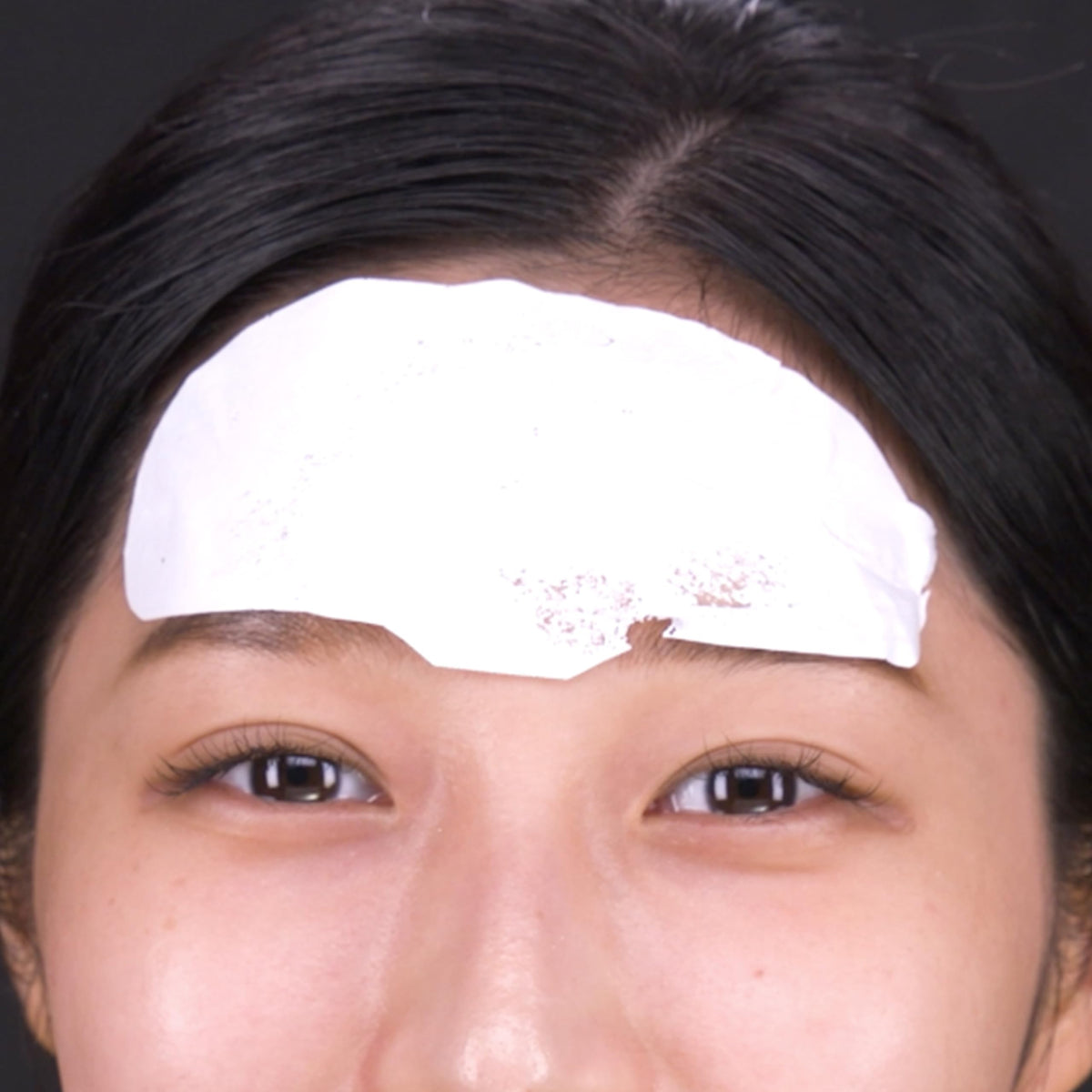 KPRODUCT4U eye and smileline patches held to show targeted fit and comfort