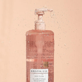 Kristin Ess close-up of shampoo texture highlighting deep-clean feel