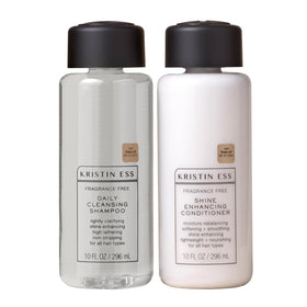 Kristin Ess front packaging of shampoo and conditioner showing simple design and benefits