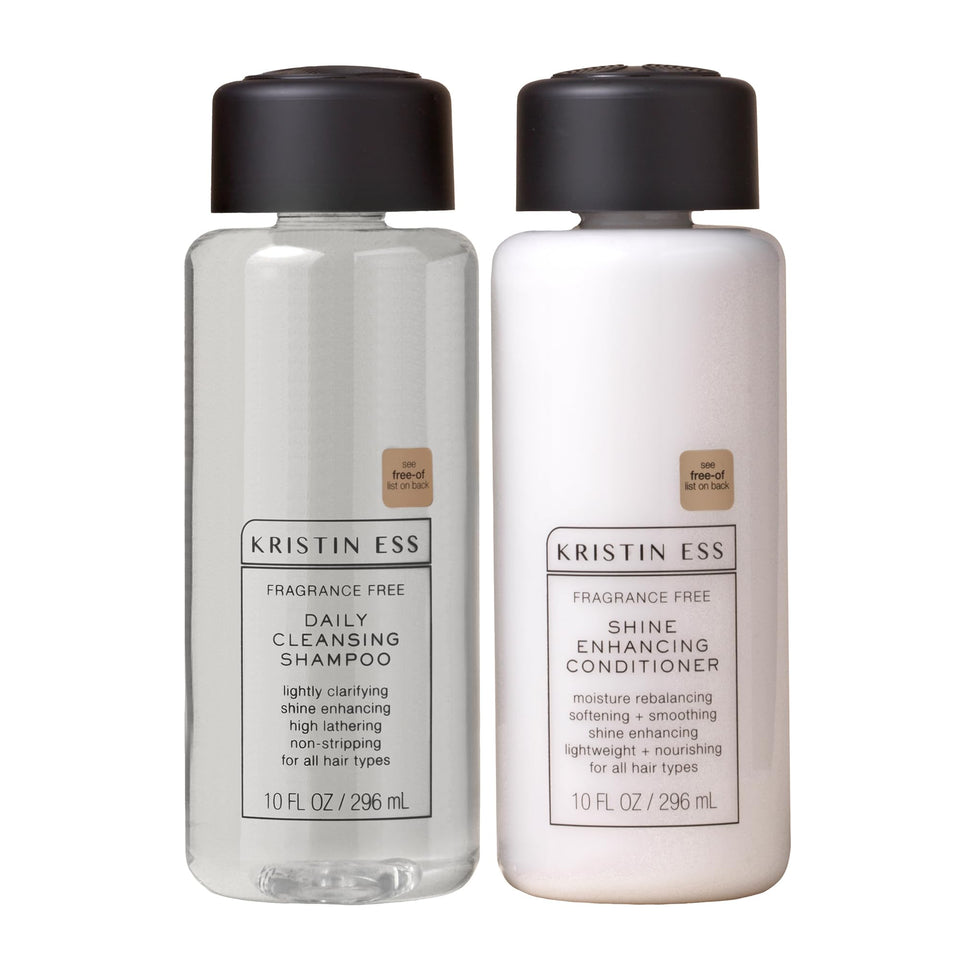 Kristin Ess front packaging of shampoo and conditioner showing simple design and benefits