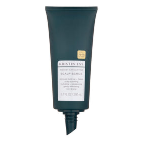 Kristin Ess being applied to wet hair in shower to remove build-up effectively