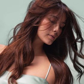 Kristin Ess label ingredient highlights showing keratin and clean formula