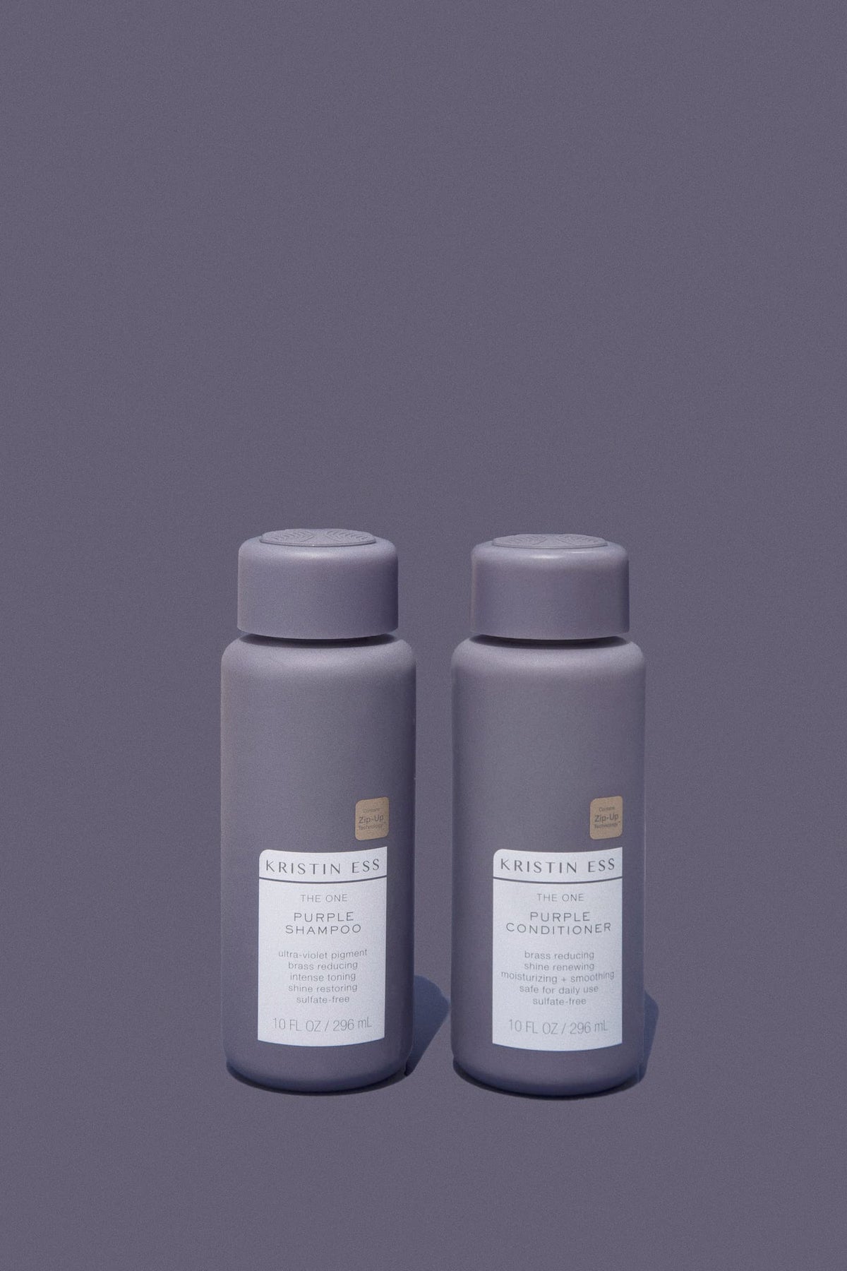 Kristin Ess shampoo pouring showing violet pigment for toning