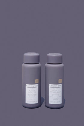Kristin Ess shampoo pouring showing violet pigment for toning