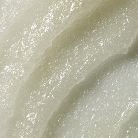 Kristin Ess scrub texture close-up showing sugar complex for gentle exfoliation