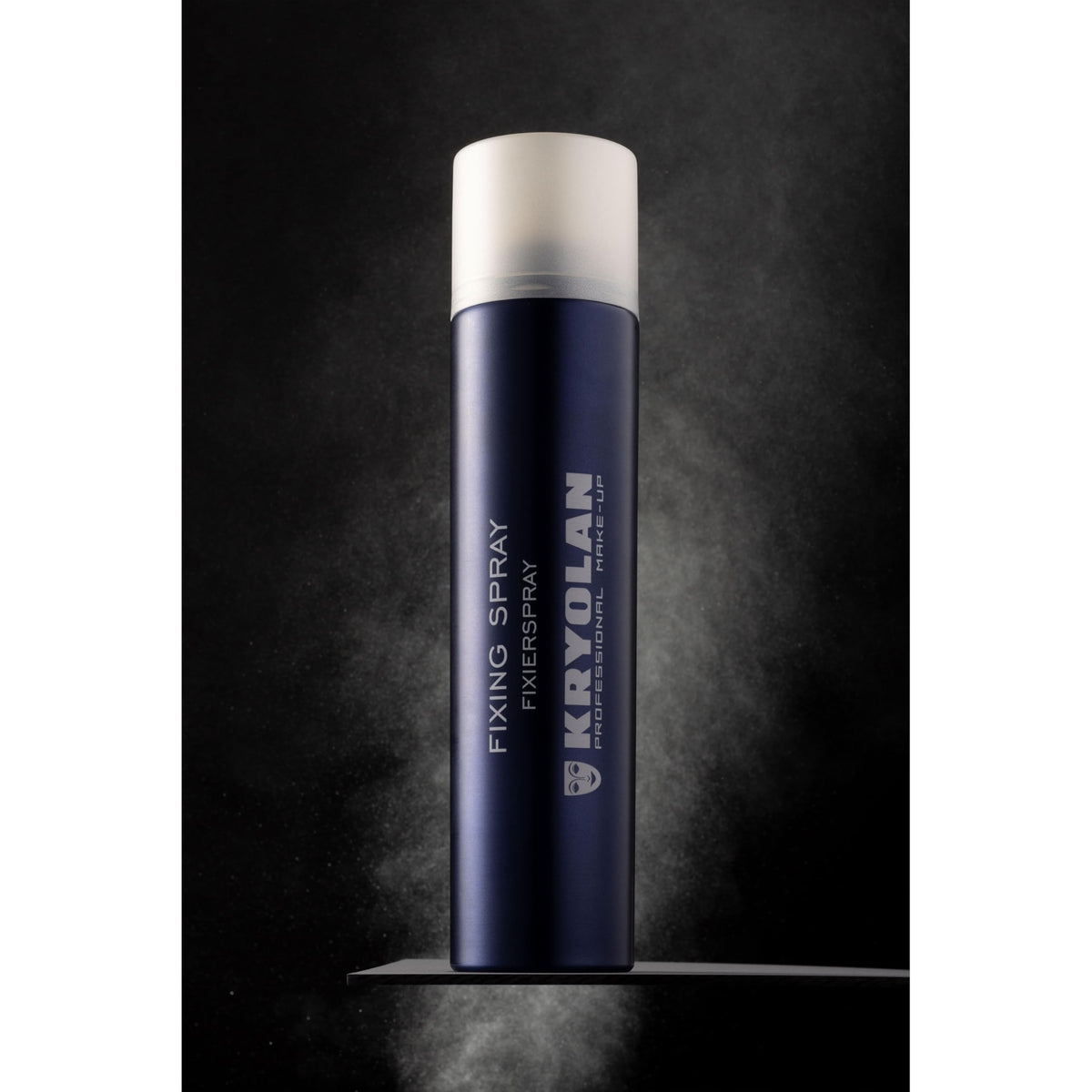 Kryolan fixing spray size comparison in hand illustrating 300 ml capacity and portability