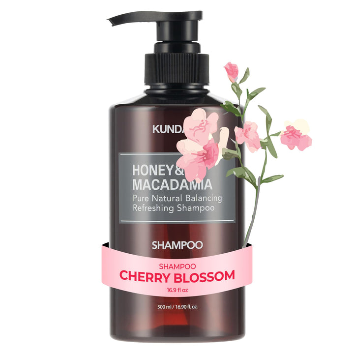 KUNDAL bottle front showing cherry blossom scent and moisturizing benefit