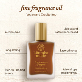 Kuumba Made bottle beside coin to show compact travel-friendly size