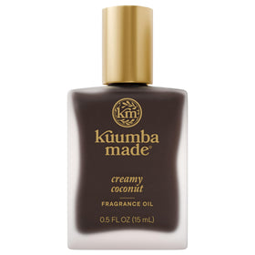 Kuumba Made front bottle showing cream coconut scent and compact size benefit