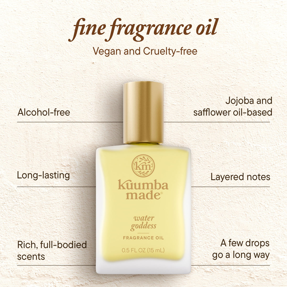 Kuumba Made bottle in hand showing compact size and portability benefit