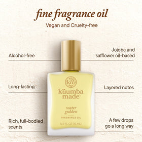 Kuumba Made bottle in hand showing compact size and portability benefit