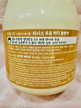KWAILNARA bottle in hand showing 19.75 fl oz scale for sizing clarity