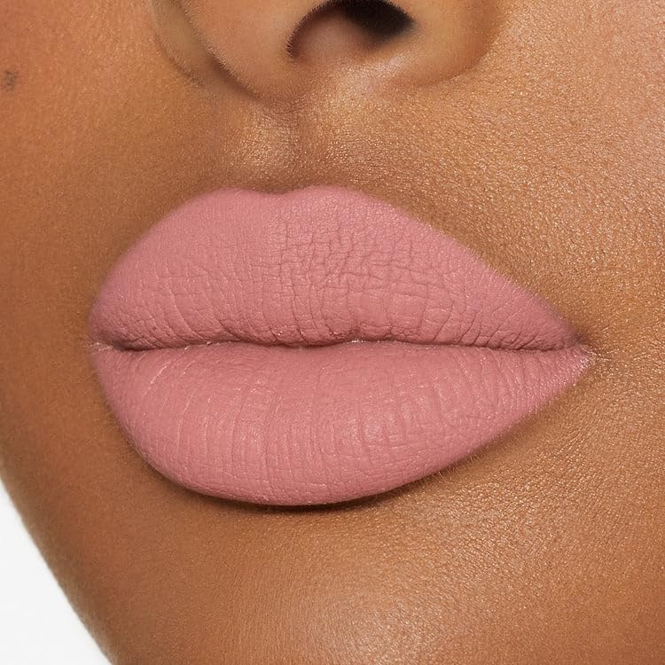 Kylie Cosmetics KOKO K kit flat lay showing lipstick tube and pencil liner for scale and contents clarity