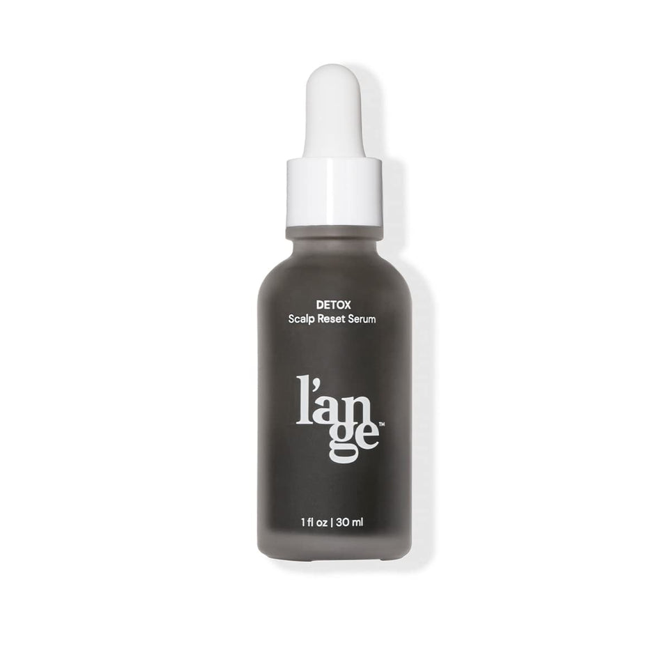 L'ANGE HAIR front packaging showing bottle and clear label, communicates clean formulation